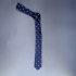 Недорогой узкий мужской галстук синего цвета с рисунками в виде якорей. thumb